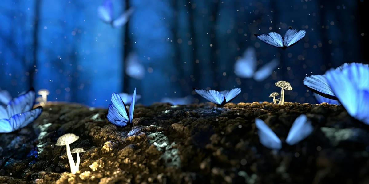 A surreal blue-tinted forest floor with small mushrooms and delicate blue butterflies hovering above the ground, creating a dreamlike, ethereal mood.